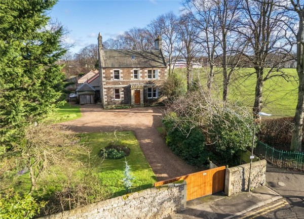 Outside aerial shot of detached country home in East Lothian, Scotland