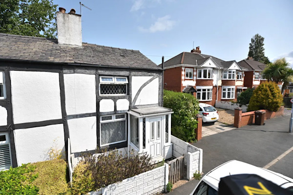 A quirky two bed cottage for sale in Wigan
