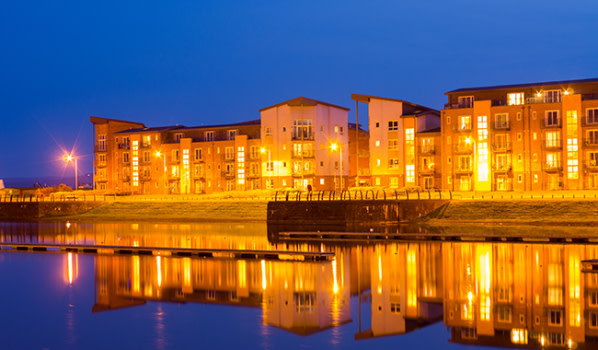 Waterfront apartments in Llanelli at night
