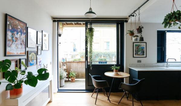 Kitchen with plants and pictures