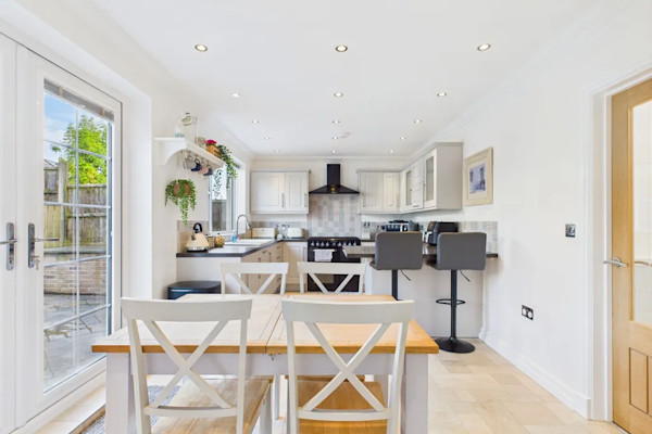 The fresh and modern kitchen of a house for sale in Whitehaven