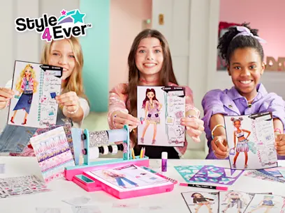 Kids playing with Style 4 Ever Fashion Designer Light-Up Studio