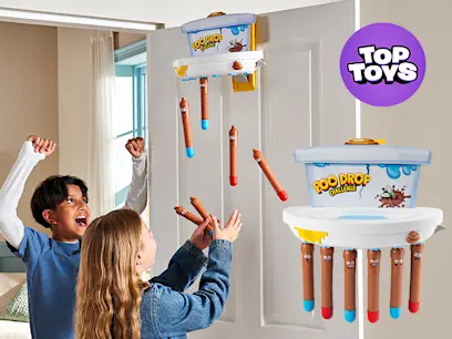 Two children play the Poo Fighters Poo Drop Challenge game, catching falling poop-shaped pieces. The game unit is mounted on a door, with the boxed set shown on the right and a Top Toys logo above.