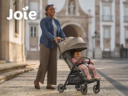 Joie Elin Compact Stroller Maple on the outdoor background baby in the stroller