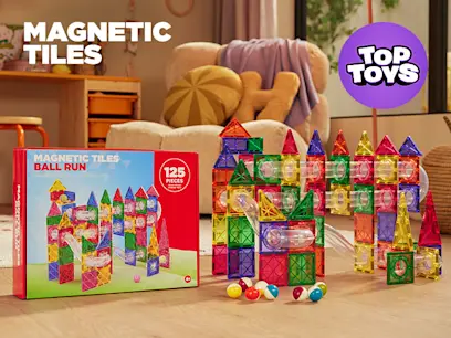 Magnetic Tiles Ball Run 125-Piece Set displayed on the floor in a room.