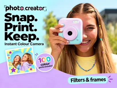 photo_creator: Snap. Print. Keep. Instant Colour Camera" with girl holding pink and teal camera to her eye; "100 colour prints included," "Filters & frames," sample heart-framed photo shown.