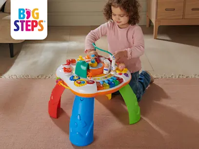 Big Steps Musical Learning Railway Activity Table on the indoor background