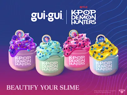 Gui Gui KPop Demon Hunters slime tubs in purple, teal, pink, and yellow, each topped with glittery slime and mix-ins, with character charms and 'Beautify Your Slime' text.