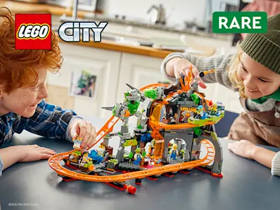 LEGO City promotional banner with two children playing with a large amusement-park roller-coaster LEGO set.