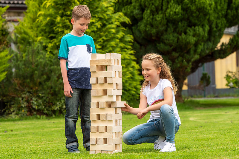 Boredom Busters Blog 6-8 Years Duplex Banners 2 Image - two children playing with giant jenga blocks