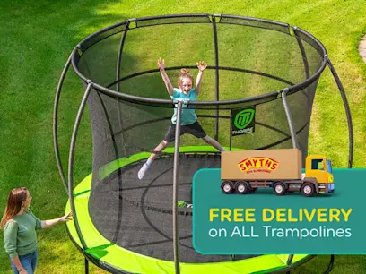 A Girl jumping on the 10ft Thorpe Sports Trampoline with Enclosure Net in a garden