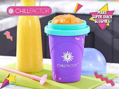 The ChillFactor Colour Shock Slushy Maker Power Purple on a table in a kitchen.