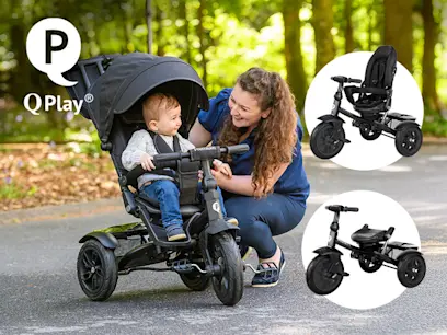 QPlay Premium 6-in-1 Trike Black on the outdoor background 