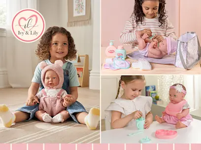 selection of Ivy & Lily baby doll Maya & accessories on the pink background 