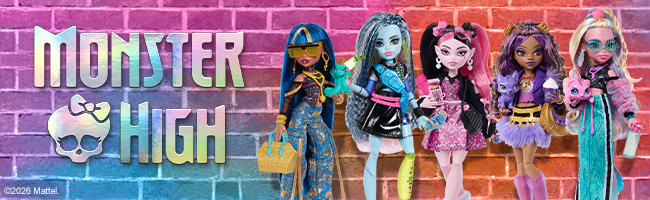 A selection of Monster High dolls displayed side by side with a colourful brick wall behind them. 