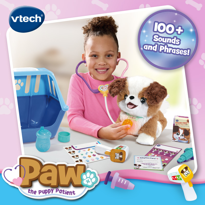 VTech Paw the Puppy Patient toy set showing a child using a stethoscope to examine a plush puppy. The set includes a pet carrier, feeding accessories, medical tools, adoption card and treats, with “100+ sounds and phrases” displayed.