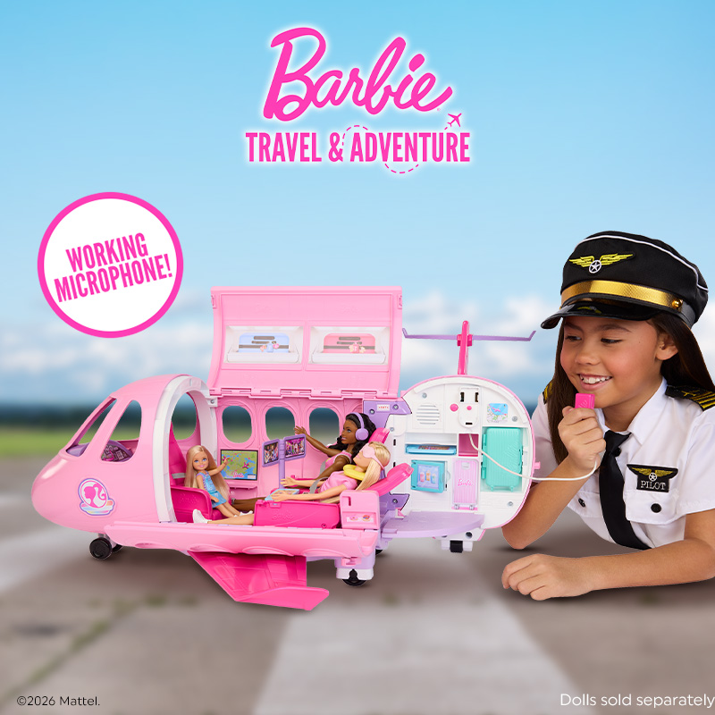 A girl speaking into the microphone for Barbie Dream Plane with an airport background behind her.