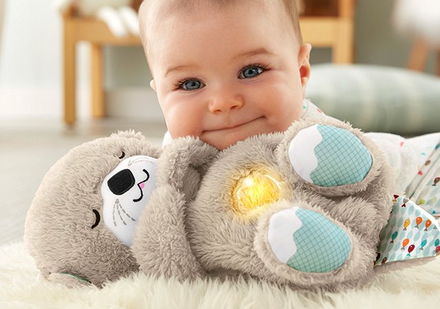 baby with soothe n snuggle otter