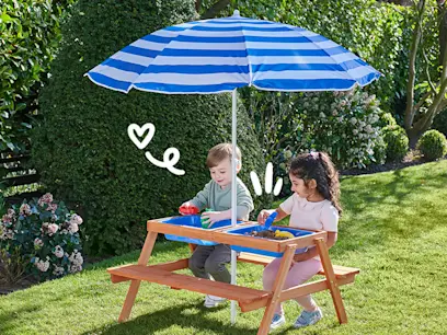 kids playing with 2-in-1 Sand and Water Picnic Table on the outdoor background