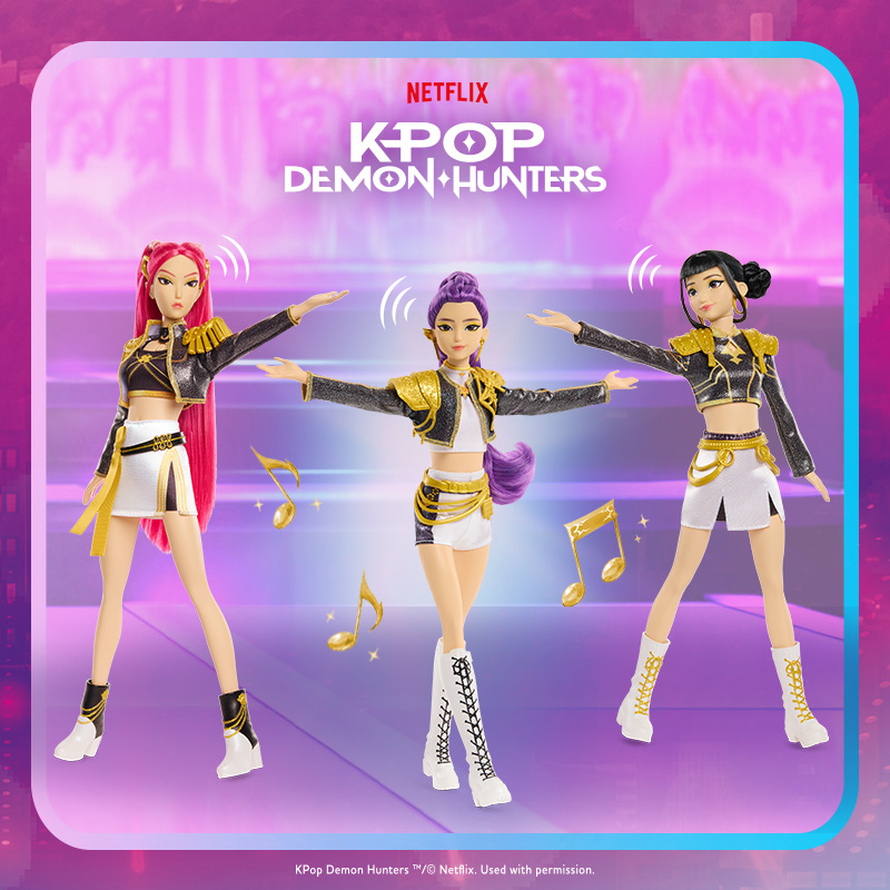 Three KPop Demon Hunters Singing Dolls on a stage with pink and purple lighting in the background.