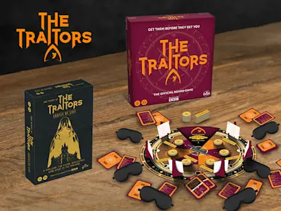 The Traitors Board Game on the burgundy background 
