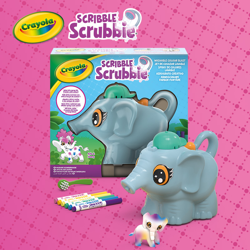 Crayola Scribble Scrubbie Washable Colour Blast product box with grey elephant sprayer toy, colorful markers, and a small painted elephant figure on a pink polka-dot background.