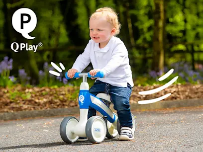 QPlay Cutey Balance Bike Blue on the outdoor background