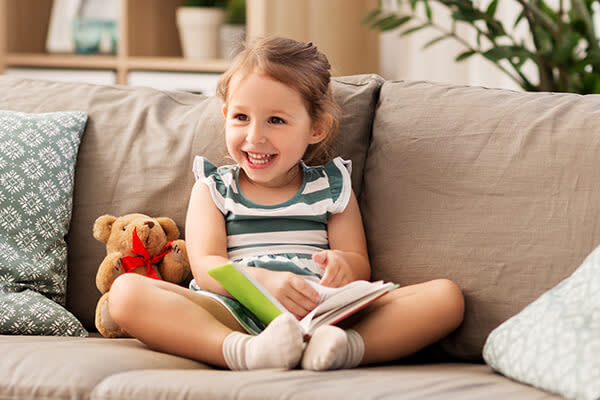 smiling girl with book