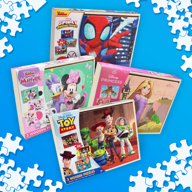 selection of exclusive wooden puzzle son the blue background 