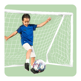 A kid playing football in front of a goal on a green background