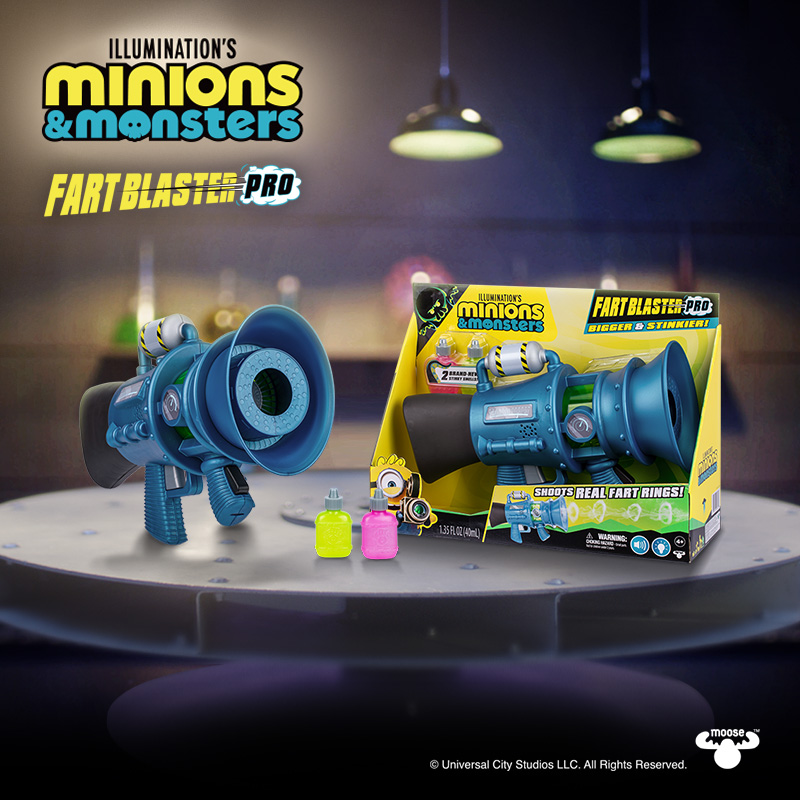 Minions & Monsters Fart Blasters on a tabletop in a darkly lit room.