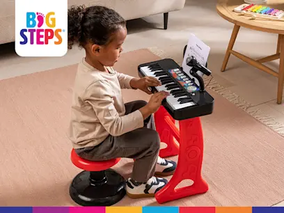 Big Steps Musical Keyboard and Stool  on the indoor background