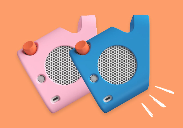 Pink and Blue Yoto jacket accessories on an orange background.