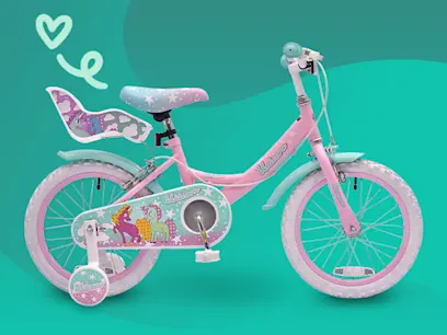 16 Inch Unicorn Bike with Doll Carrier on a green background