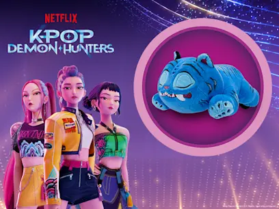 K-Pop Demon Hunters characters and the Netflix K-Pop Demon Hunters Plush Sleeping Derpy Tiger 45cm on a brightly coloured background.
