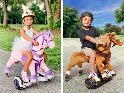 Two kids sitting on the Power Pony Electric Ride Ons on a footpath outdoors.