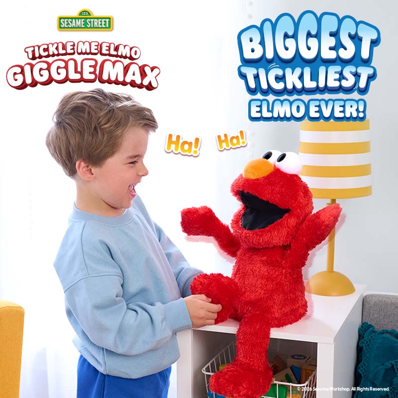 Sesame Street Tickle Me Elmo Giggle Max Interactive Toy on the grey background