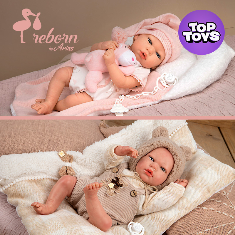 Two lifelike baby dolls with realistic features. The top doll wears pink, holds a plush toy, and has a gentle expression. The bottom doll is in a bear-themed outfit, lying on a soft blanket, looking content.