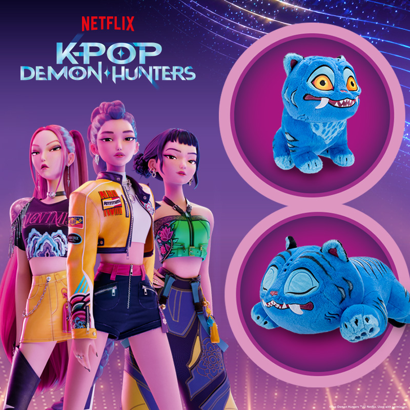 Two Netflix KPop Demon Hunters Derpy Tiger plushes on the Netflix KPop Demon Hunters movie themed purple and pink background.