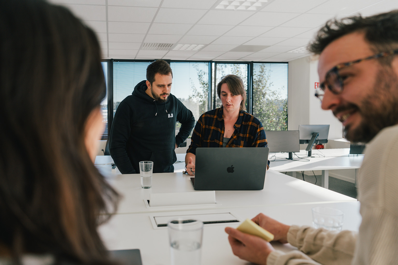 Image of our team engaged in a meeting