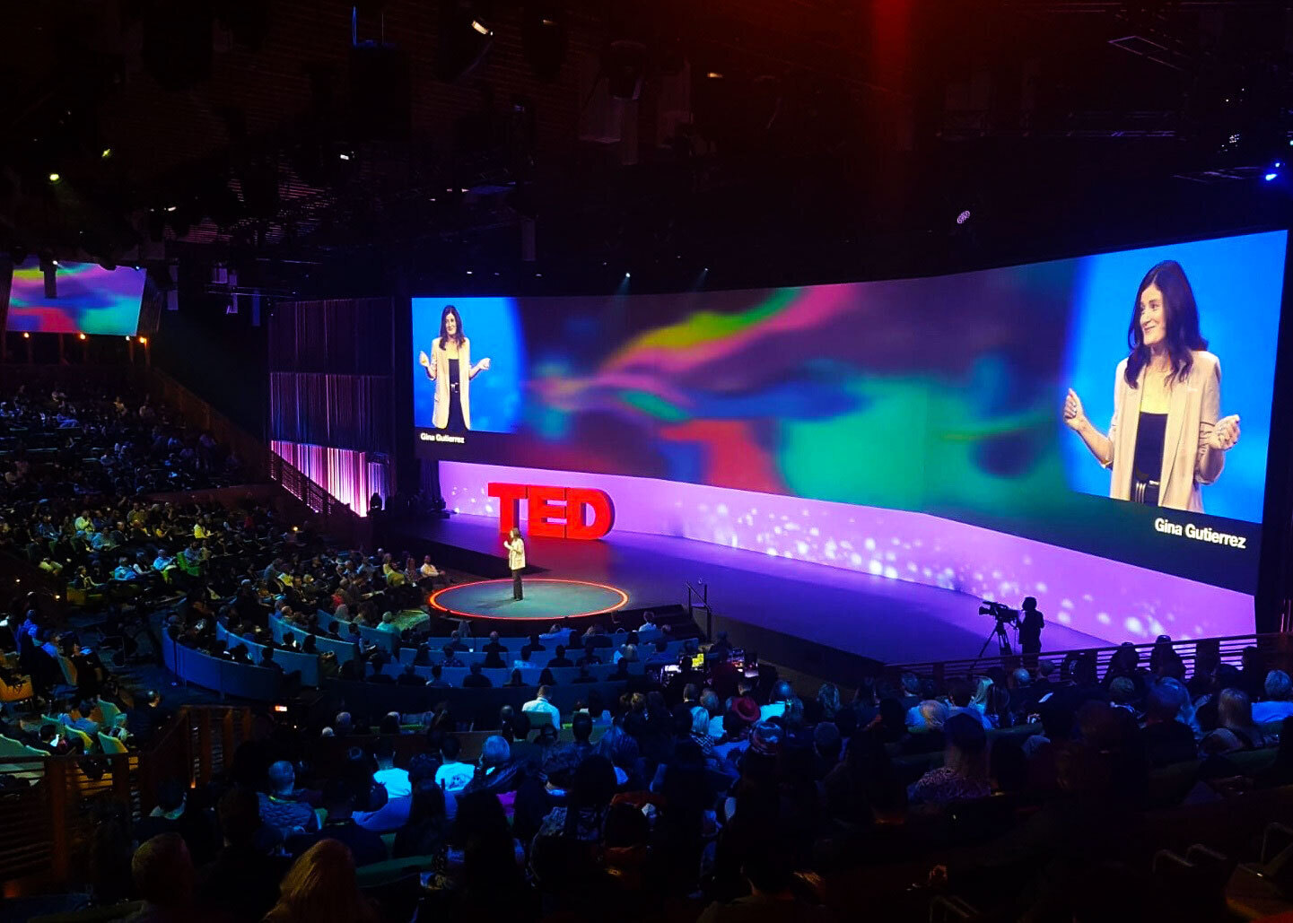 Gina on TED stage