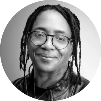 Dr Beverley Barnett-Jones h.c black and white headshot.