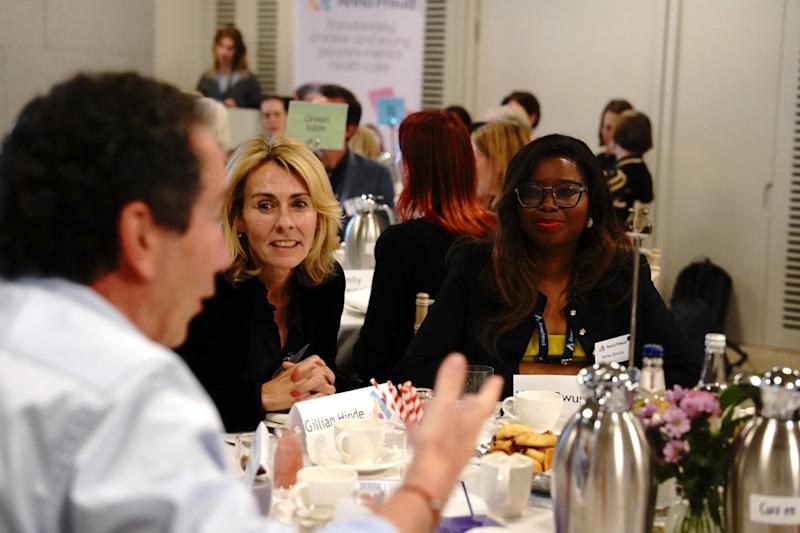 Staff at Anna Freud having a discussion during the Patron's visit.