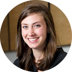 Christina Carlisi headshot, looking directly at the camera, smiling.