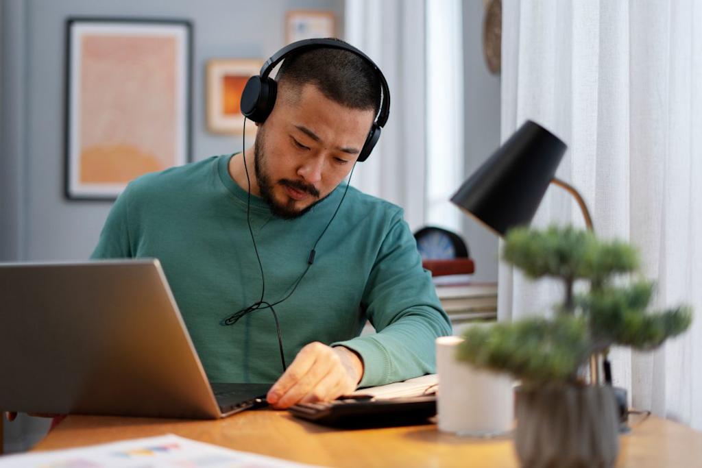 Medium shot man working from home