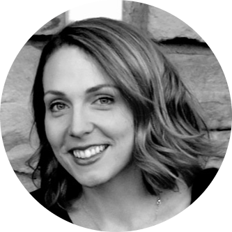 A black and white headshot of Melissa Cortina, Senior Research Fellow.