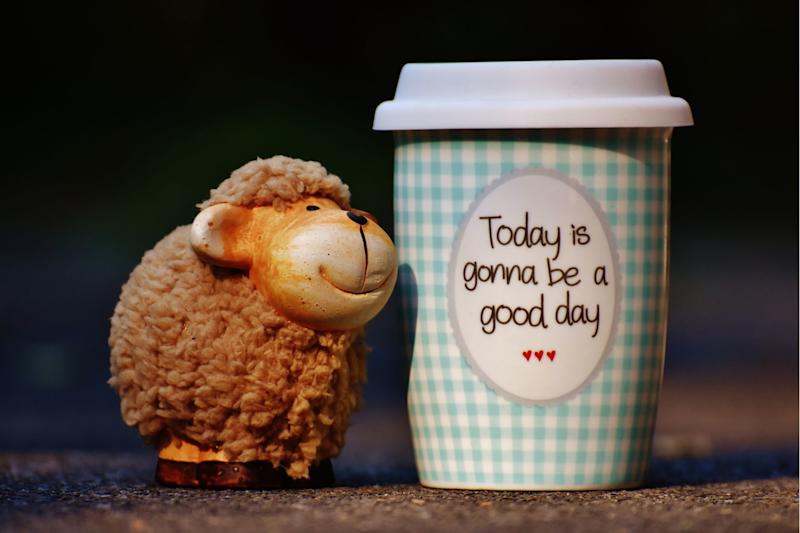 Photo of a coffee cup with the message 'Today is gonna be a good day' on it.