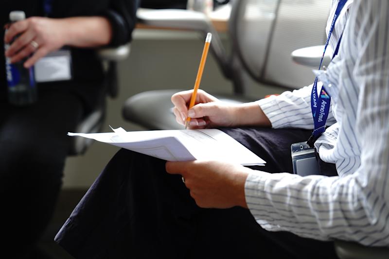 An Anna Freud employee taking notes during a meeting.