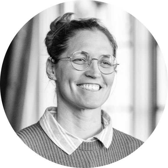 Alexis Quinn, black and white headshot.