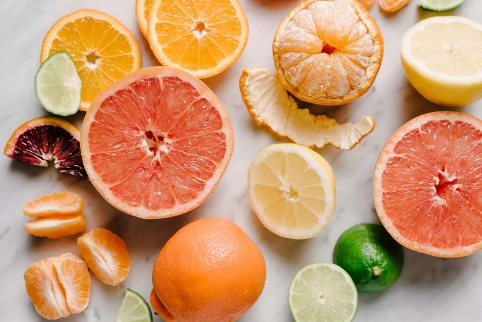 A variety of citrus fruits, including oranges, lemons, limes, grapefruit, blood orange and mandarin orange